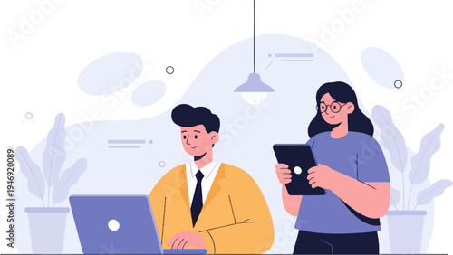 Two coworkers collaborate on a project, one using a laptop and the other a tablet