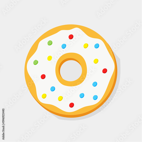 A delicious looking donut with white icing and colorful sprinkles, perfect for a sweet treat