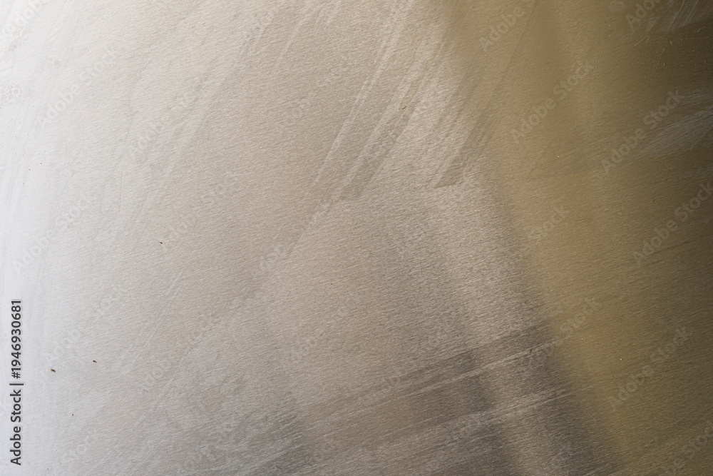 Obraz premium Textured golden background with subtle brushstrokes, perfect for design and digital projects. Use as a background, textu