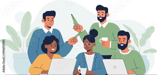 Diverse team collaborating on laptops with a pen and coffee mugs