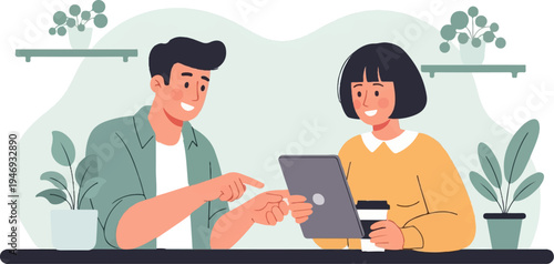 Two people sharing a tablet with a coffee cup and plants nearby