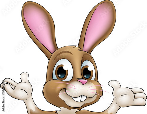 An Easter bunny rabbit cartoon character peeking around a sign
