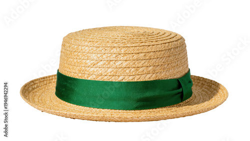 Fotografie Isolated classic straw boater hat with a vibrant green ribbon band for summer style