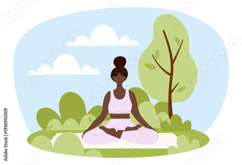 A young black woman practicing yoga outdoors. African american female in lotus pose or Padmasana sitting on a mat in a park with trees. Nature and wellness lifestyle.