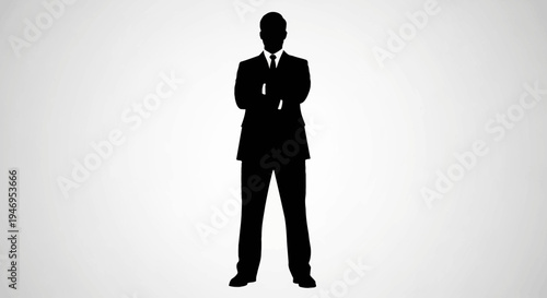 Silhouette of a Businessman in a Suit with Arms Crossed