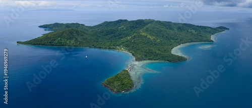 The beautiful island of Makogai in Fiji is fringed by a healthy coral reef. Fiji's reefs support high marine biodiversity and are a popular destination for scuba divers and snorkelers.