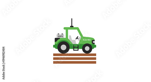 Green tractor on brown soil.