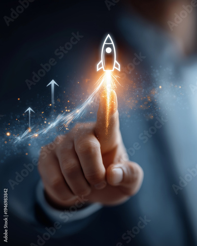 Wallpaper Mural Digital Startup: A close-up shot of a person's finger pointing upwards at a glowing rocket icon, symbolizing innovation, growth, and the launch of a successful digital startup. Torontodigital.ca