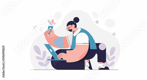 A person with glasses and bun hairstyle working on a laptop while holding a phone