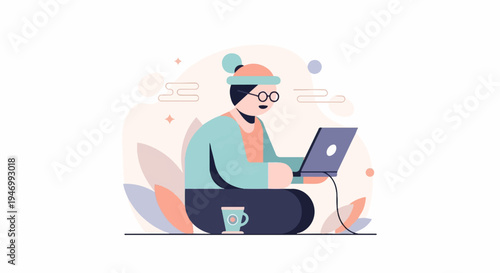 Person with glasses wearing a beanie works on a laptop, cup nearby