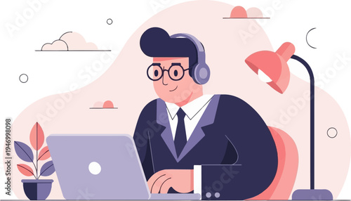 Focused man in suit and headphones works on laptop at desk