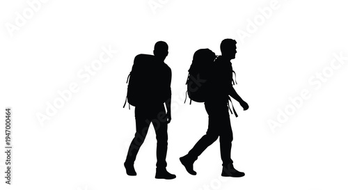 Two hikers with backpacks walking a striking black silhouette