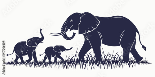 A family of elephants walking together in a grassy field with a large adult and two smaller ones