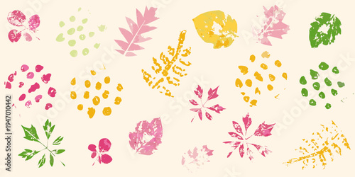 Colorful leaf prints scattered across a cream colored background