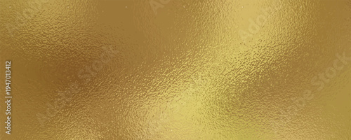 Gold metallic effect foil. Golden texture for design. Beautiful background. Abstract glitter mottled speckled structure.