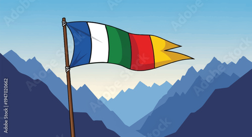 A colorful flag flies proudly above majestic, layered blue mountains under a light blue sky