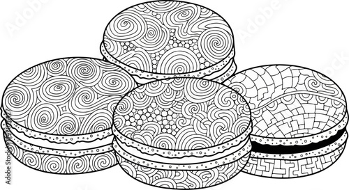 Four intricately patterned cookies with swirling designs, forming a delightful confectionary arrangement