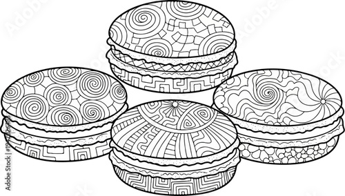 Four round cookies with intricate swirling patterns filling their shells, layered like sandwiches
