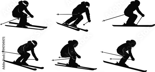 Silhouettes of skiers and snowboarders on snow