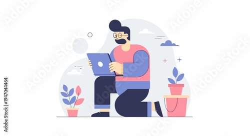 Bearded man in glasses kneels with laptop, plants nearby, soft background