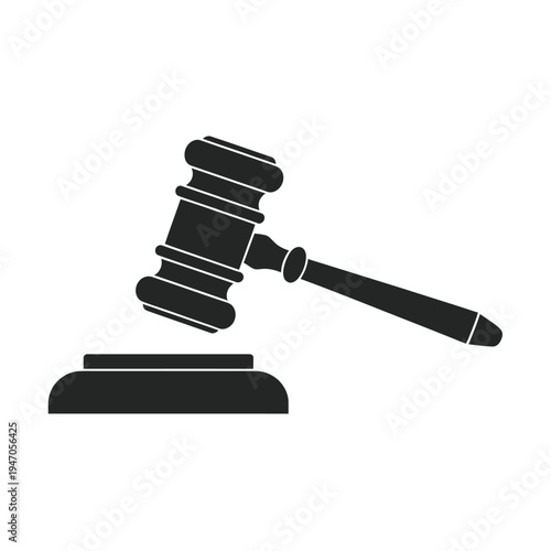 A black silhouette of a gavel resting on a sounding block