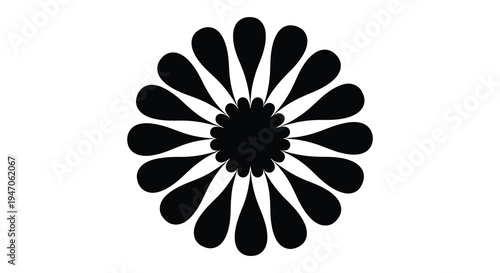 A symmetrical black floral design resembling a chrysanthemum or daisy