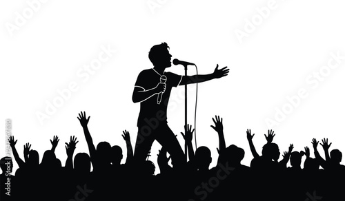 A black silhouette of a male singer performing on stage in front of a cheering crowd of fans now