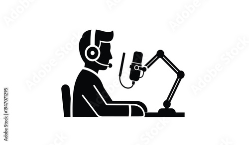 A male podcaster wearing headphones speaks into a professional microphone mounted on an arm stand