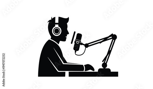 A silhouette of a person wearing headphones while speaking into a professional studio microphone