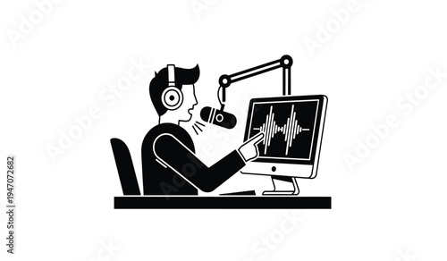 A male radio host sitting at a desk and speaking into a professional microphone during a broadcast