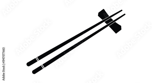 Black silhouette of a pair of chopsticks with a chopstick rest displayed on white