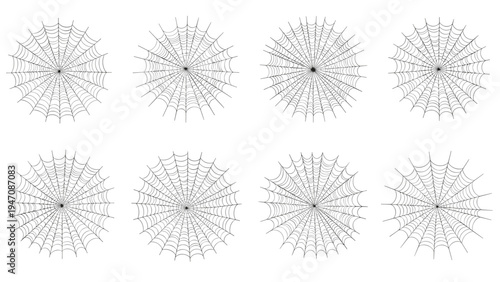 Collection of eight symmetrical white spider web illustrations with intricate radial patterns isolated on a plain white background.