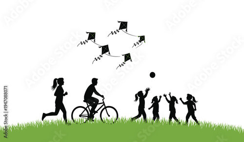 Silhouettes of children playing outdoors with kites and bicycles on a green grass field landscape