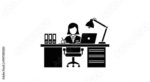 Businesswoman working at desk with laptop and files