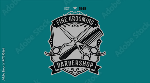 Vintage Barbershop Emblem with Scissors and Comb.