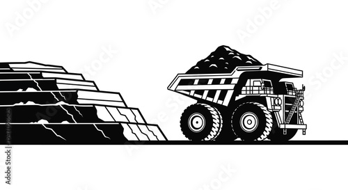 A large dump truck carries a full load near a quarry in a striking black and white silhouette