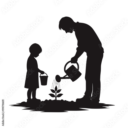 Child and adult watering young plant together in garden