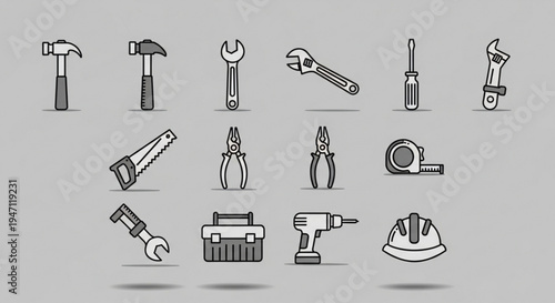 Collection of various hand tools and equipment for construction and repair work on a gray background