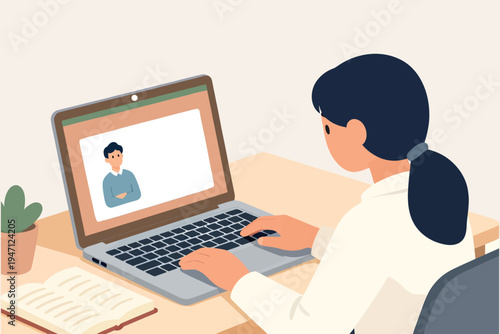 Woman having a virtual meeting on her laptop with a colleague
