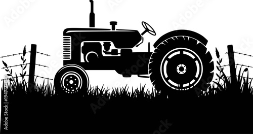 Black silhouette of a vintage tractor in a grassy field with barbed wire fence white
