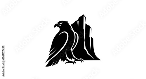 Eagle perched on rocky cliff silhouette