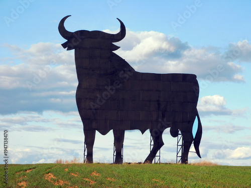 Osborne Bull Silhouette on a Green Hill in Spain