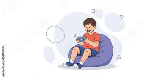 Happy boy playing video game on smartphone while sitting on bean bag chair
