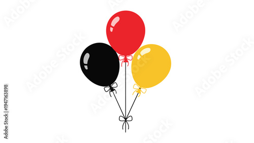 Bunch of three helium balloons in black red and yellow colors tied together for celebrations birthdays and events.