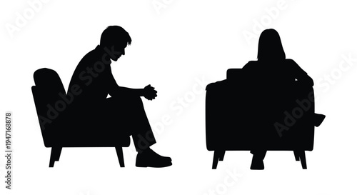 Two people in chairs facing each other depicted as a silhouette
