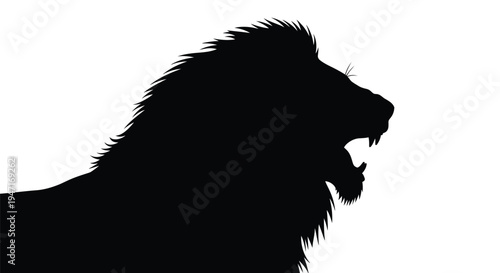 Majestic lion with a full mane roars fiercely a striking silhouette