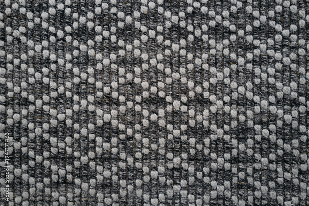 Fototapeta premium Close-up of woven gray upholstery textile