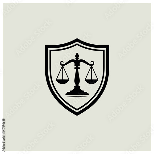 A black silhouette of a classic balance scale, representing justice and law, enclosed within a protective shield emblem on a light grey background.