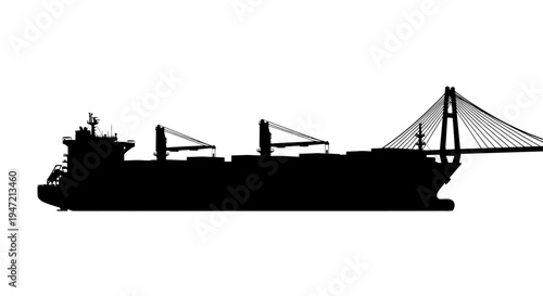 Cargo Ship Silhouette Passing Under Suspension Bridge