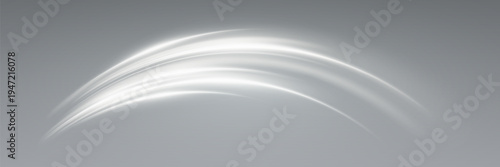 Soft white light trails forming smooth curved arcs on gray background.